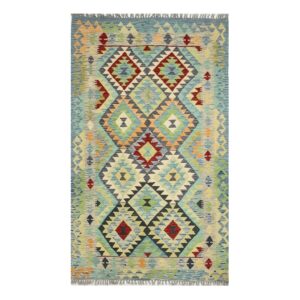 Tapete artesanal com design geométrico e cores vibrantes em estilo kilim.