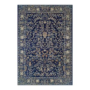 Tapete persa luxuoso em azul marinho com padrões florais intricados e detalhes em dourado.