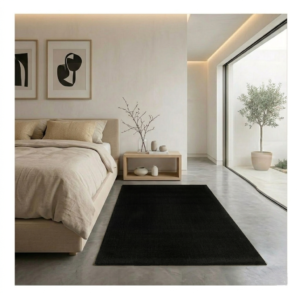 Retângulo preto de tecido texturizado em fundo branco minimalista.